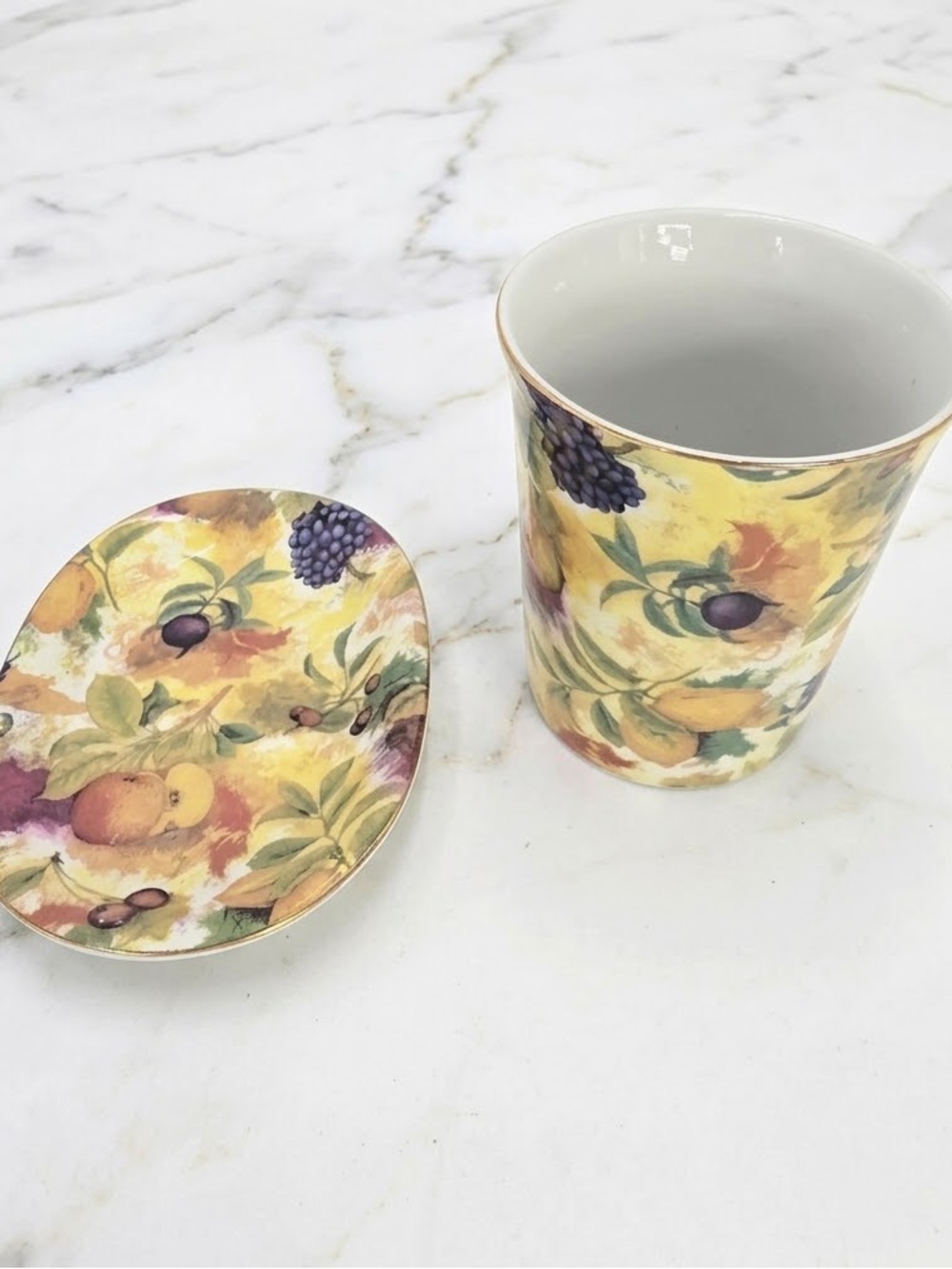 The Formalities by Baum Brothers Collection Dish Set includes ceramic cups featu